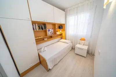 Cama o camas de una habitación en HomeHolidaysRentals Bluemar-Costa Barcelona
