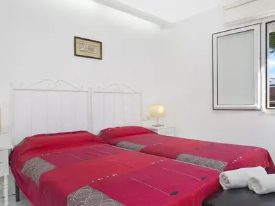 Cama o camas de una habitación en 0320 Apartament in Calella de Palafrugell