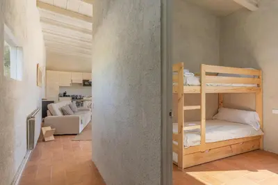 Cama o camas de una habitación en Casa de campo Masos de Pals con parking y piscina