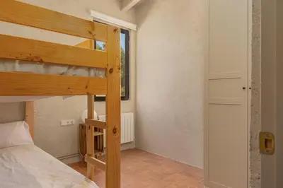 Cama o camas de una habitación en Casa de campo Masos de Pals con parking y piscina