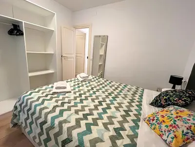 Cama o camas de una habitación en Apartamento cerca de la playa