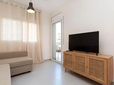 Una televisión o centro de entretenimiento en Apartment Melucia by Interhome