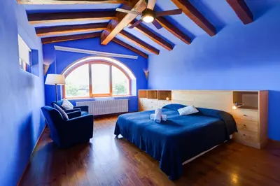 Cama o camas de una habitación en Mas Petit, turisme rural