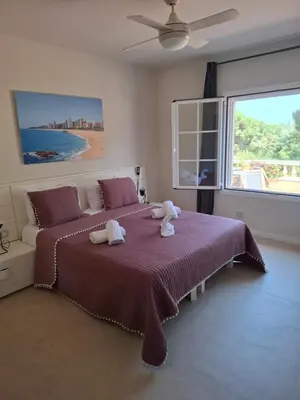 Cama o camas de una habitación en La Casa Celestial