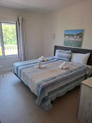 Cama o camas de una habitación en La Casa Celestial