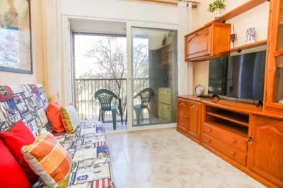 Una televisión o centro de entretenimiento en Apartment Equiped Fenals Beach