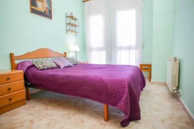 Cama o camas de una habitación en Apartment Equiped Fenals Beach
