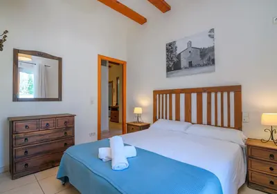 Cama o camas de una habitación en Cal Metge de Gualba