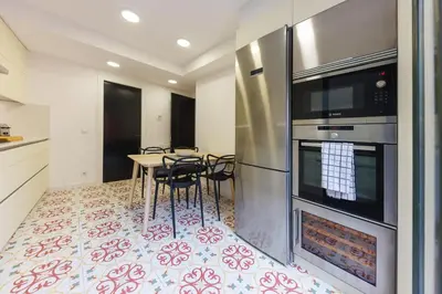 Una cocina o zona de cocina en Bravissimo Cort Reial Palau, Duplex penthouse
