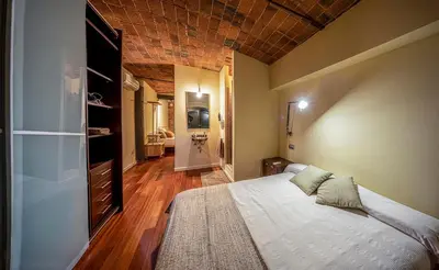 Cama o camas de una habitación en dúplex st Pere OnyarapartamentsCom