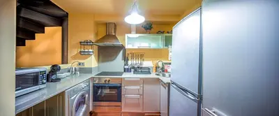 Una cocina o zona de cocina en dúplex st Pere OnyarapartamentsCom