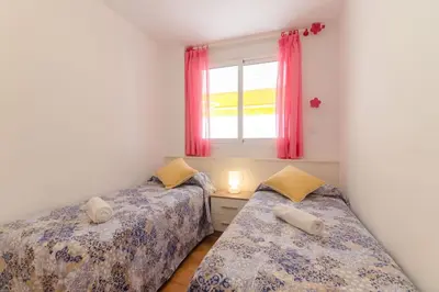 Cama o camas de una habitación en Apto Park Lein, 5 huéspedes muy cerca de la playa