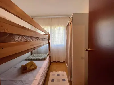Cama o camas de una habitación en Encantador apartamento en Playa de Aro