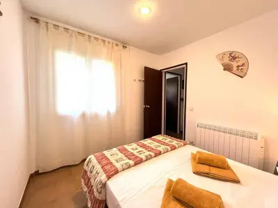 Cama o camas de una habitación en Encantador apartamento en Playa de Aro
