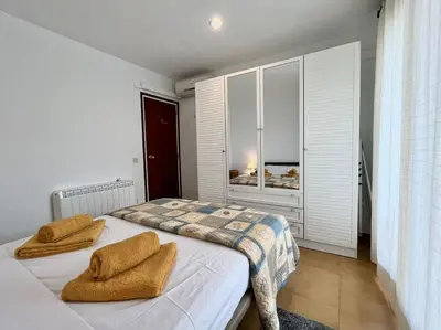 Cama o camas de una habitación en Encantador apartamento en Playa de Aro