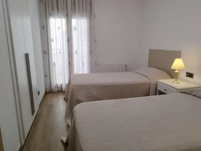 Cama o camas de una habitación en Marítim II Primera línea de mar en St Antoni de Calonge