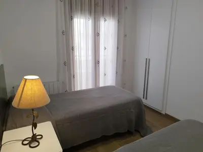 Cama o camas de una habitación en Marítim II Primera línea de mar en St Antoni de Calonge