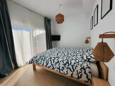 Cama o camas de una habitación en Apartament a Palamós amb plaça de parking