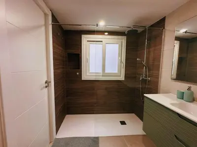Un baño de Apartament a Palamós amb plaça de parking