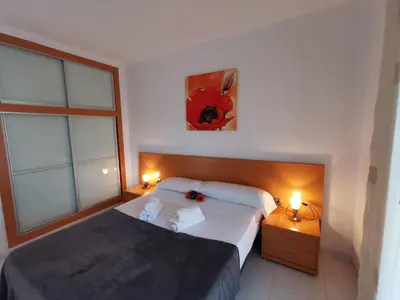 Cama o camas de una habitación en Apartamento con WIFI a 5 Minutos de la Playa y Cerca de Tiendas y Restaurantes - ES-209-10