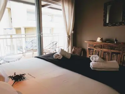 Cama o camas de una habitación en Apartamento en primera línea de mar en Platja d'Aro, tranquilo y soleado, con terraza y parking - ES-209-23
