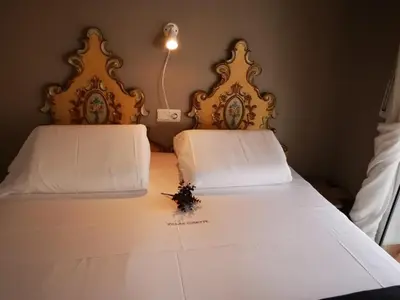 Cama o camas de una habitación en Apartamento en primera línea de mar en Platja d'Aro, tranquilo y soleado, con terraza y parking - ES-209-23