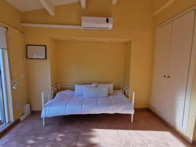 Cama o camas de una habitación en Villa élégante à Platja d'Aro près de la plage, climatisée avec terrasse et proche des boutiques et restaurants - ES-209-35