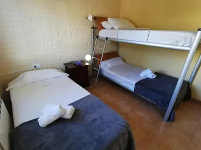 Cama o camas de una habitación en Villa élégante à Platja d'Aro près de la plage, climatisée avec terrasse et proche des boutiques et restaurants - ES-209-35