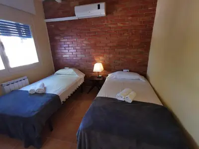 Cama o camas de una habitación en Villa élégante à Platja d'Aro près de la plage, climatisée avec terrasse et proche des boutiques et restaurants - ES-209-35