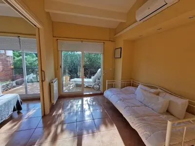 Cama o camas de una habitación en Villa élégante à Platja d'Aro près de la plage, climatisée avec terrasse et proche des boutiques et restaurants - ES-209-35
