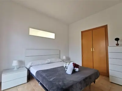 Cama o camas de una habitación en Apartamento en el Centro de Platja d'Aro con Piscina, Terraza y Cerca de la Playa - ES-209-45
