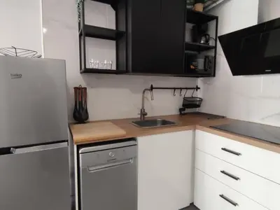 Una cocina o zona de cocina en Apartamento luminoso cerca de la playa con terraza vintage en Platja d'Aro - ES-209-64