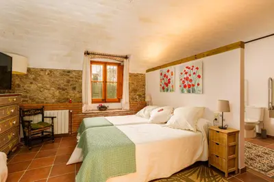 Cama o camas de una habitación en Mas Gran de Cruïlles - Mas Rural - Hotel & Events