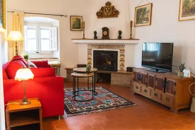 Una televisión o centro de entretenimiento en Mas Gran de Cruïlles - Mas Rural - Hotel & Events