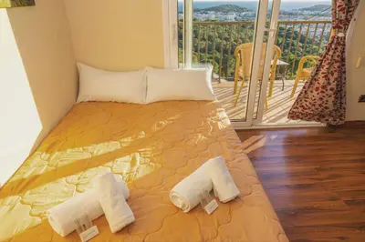 Cama o camas de una habitación en Villa Mare Nostrum,12 personen, panoramisch zeezicht