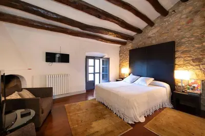 Cama o camas de una habitación en Casa Rufina, Exclusive & Charming Stone House in Costa Brava