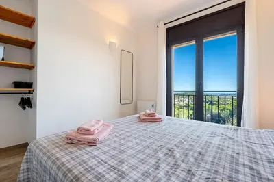 Cama o camas de una habitación en Hauzify I Mas Formic