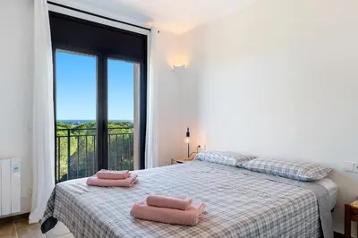 Cama o camas de una habitación en Hauzify I Mas Formic