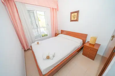 Cama o camas de una habitación en HomeHolidaysRentals Ancora - Costa Barcelona