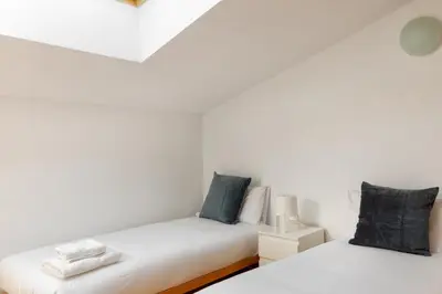 Cama o camas de una habitación en Flateli Cort Reial 7