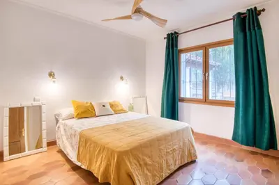 Cama o camas de una habitación en Mas Tomasi 264