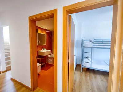 Cama o camas de una habitación en Pinzon, gezellige familievilla met groot zwembad.