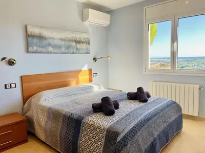 Cama o camas de una habitación en L'orada by Costabravaway