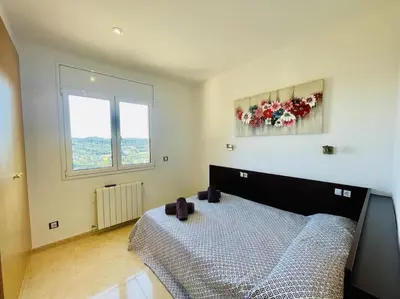Cama o camas de una habitación en L'orada by Costabravaway