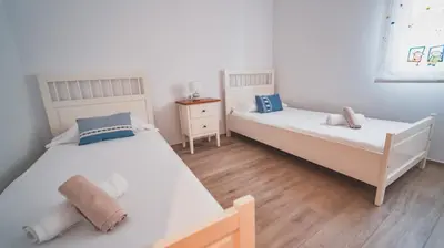 Cama o camas de una habitación en SeaHomes Vacations - NAUTIC MARITIME Apt