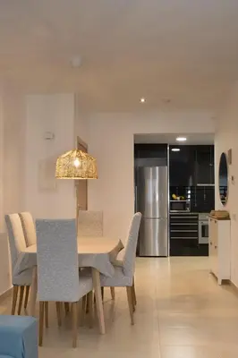 Una cocina o zona de cocina en Modern Beach Apartment - La Maca