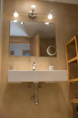 Un baño de Modern Beach Apartment - La Maca