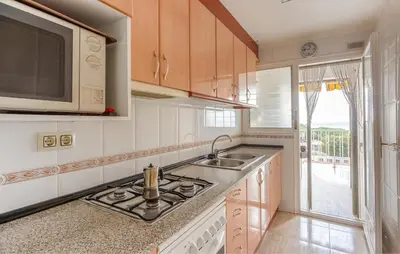 Una cocina o zona de cocina en Malgrat de mar barcelona