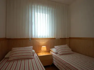Cama o camas de una habitación en Lets Holidays EXCELLENT APARTMENT NEXT BEACH