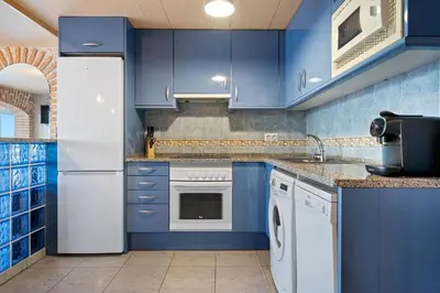 Una cocina o zona de cocina en Hauzify I Apartament Plenamar
